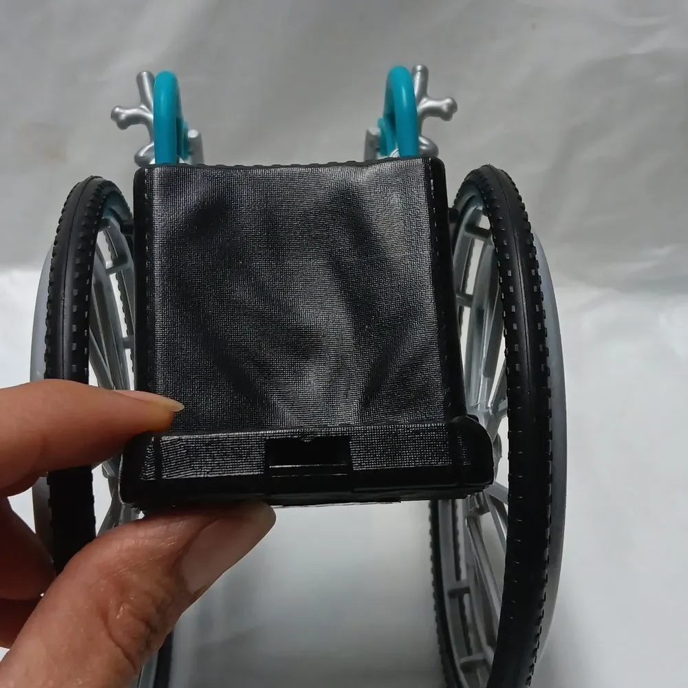 Mattel 2018 Barbie Rolling Aqua Blue Wheelchair